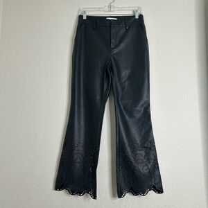 Anthropologie black faux leather cut out pants